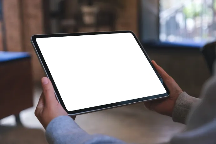 hands-holding-tablet-with-blank-screen-indoors-2026-03-16-00-31-45-utc.webp
